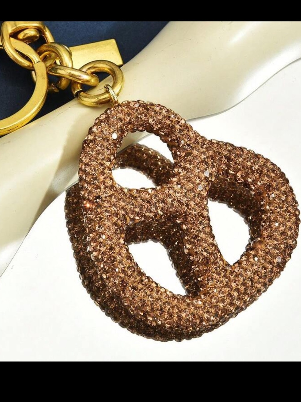 Coach Gold-Tone Crystal Pretzel Key Charm in Rose Gold Crystal - Picture 2 of 2